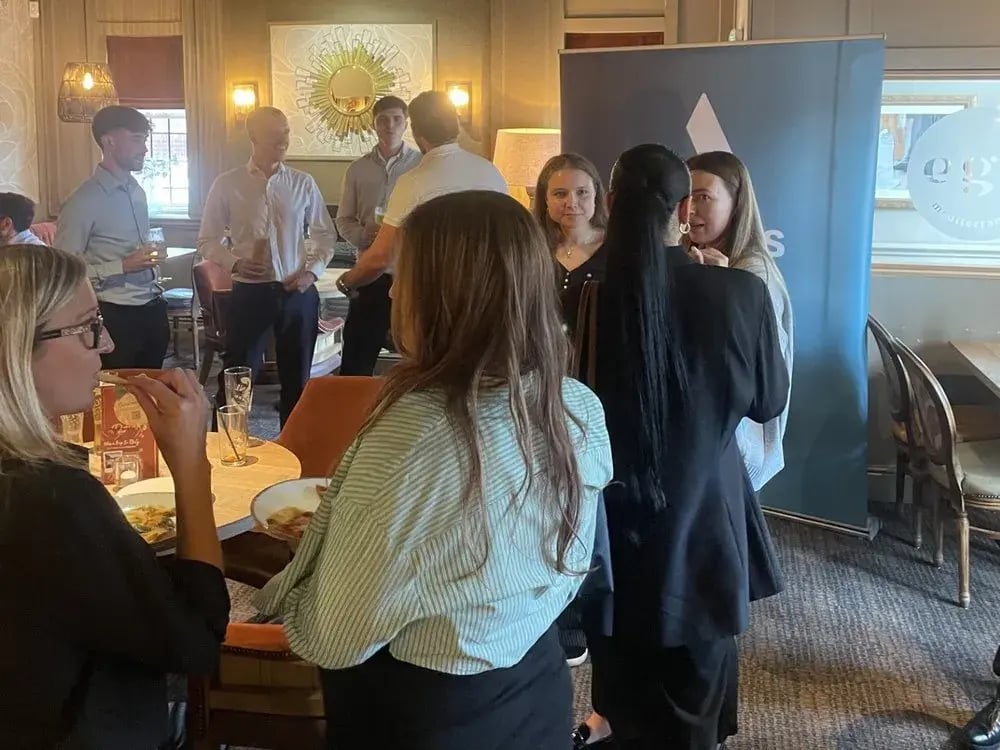 Guests chatting at the September 2026 5:05