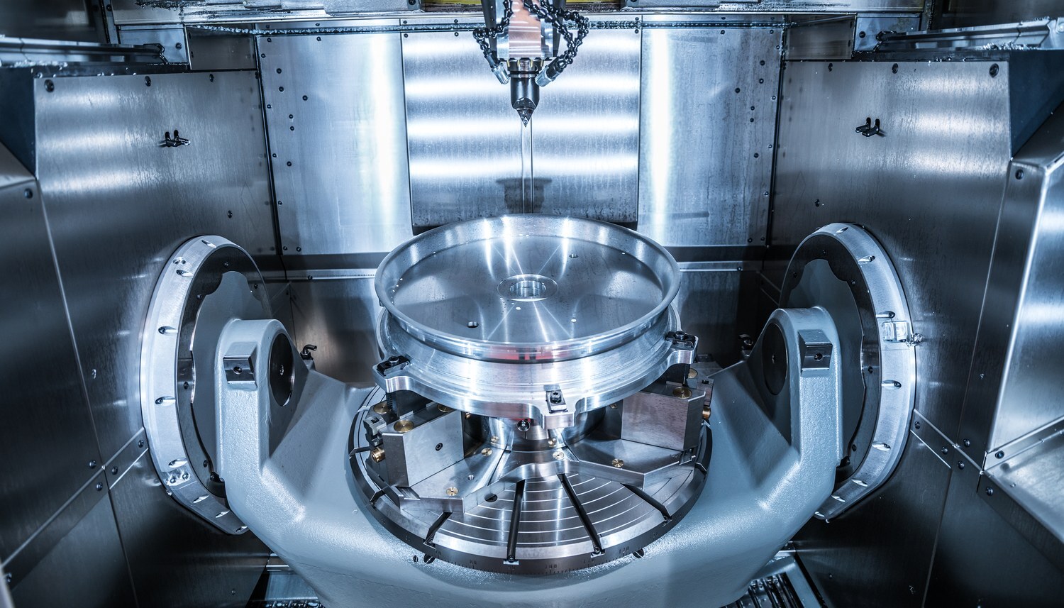 A five-axis CNC machine milling a large aluminium part